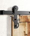 Space Saving Black Rustic Double Track U Shape Bypass Sliding Barn Door Hardware Kit For Two Doors With 4.5 Foot Flat Track And Twig Design Rollers For Smooth Quiet Easy Sliding installed view