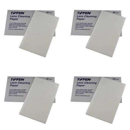 Four packs of Tiffen Lens Cleaning Paper with white tissue sheets, 50 sheets per pack.