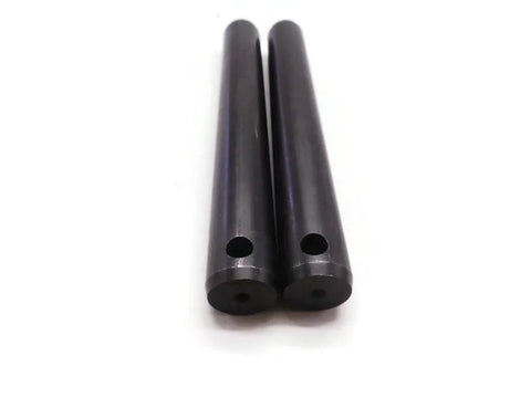 Close-up of two metal components from Dipper Stick And Tipping Link Repair Kit For Backhoe Loaders Compatible With 210S 212S 2CX MIDI CX 2CXS 2DX 2DXL And 3CX Ensures Smooth Linkage Movement And Extended Durability With High Quality Construction For Heavy Duty Operation.