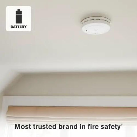 Ceiling-mounted Two In One Smoke And Carbon Monoxide Alarm With Battery Powered Detector And Slim Profile Design Model SMCO200 in room.