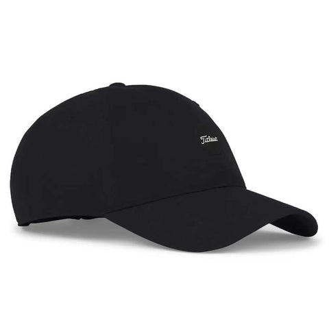 Montauk Lightweight Golf Hat With UPF 50 Sun Protection Black White Adjustable Velcro Cap side view on a white background