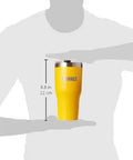 Kickass 30 Oz Stainless Steel Tumbler With Double Wall Vacuum Insulation And Spill Proof Lid To Keep Your Morning Brew Epic While You Conquer The Daily Grind In Yellow held in hands to show size.