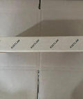KRETLAW mini grease gun box seen from the side, with repeating KRETLAW branding.