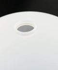 Close-up of white silicone Overhead Drilling Dust Bowl Silicone Dust Cover For Ceiling Light Install No Mess Cleanup Reduces Drill Debris By 90 To 95 Percent Reusable Flexible Bowl White Not Including Hole Saw Or Drill Driver with central hole