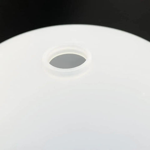 Close-up of white silicone Overhead Drilling Dust Bowl Silicone Dust Cover For Ceiling Light Install No Mess Cleanup Reduces Drill Debris By 90 To 95 Percent Reusable Flexible Bowl White Not Including Hole Saw Or Drill Driver with central hole