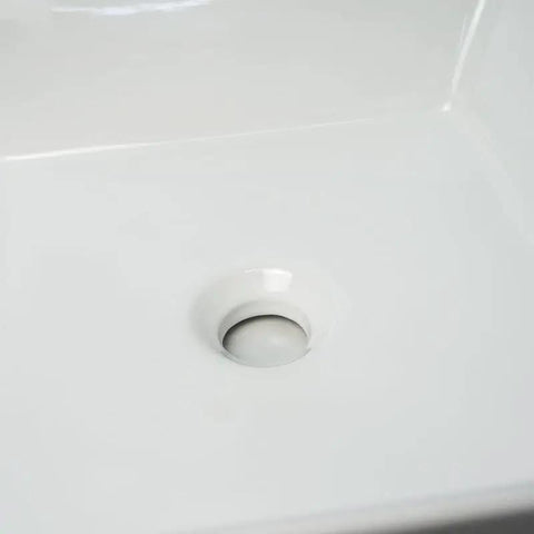 Close-up of USZWBY Vessel Sinks Bathroom Vessel Sink Modern Simple Balcony Ceramic Single Basin with drain hole.