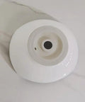 USZWBY Vessel Sinks Bathroom Vessel Sink Modern Simple Creative White Art Counter Basin Hotel Apartment Ceramic Wash Bathroom Bowl Sink top view showing inner bowl and drain hole.