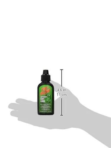 Biodegradable Soy Lubricant With PTFE Additives, 2 Oz Drip Bottle shown in hand for size reference, illustrating the compact bottle.
