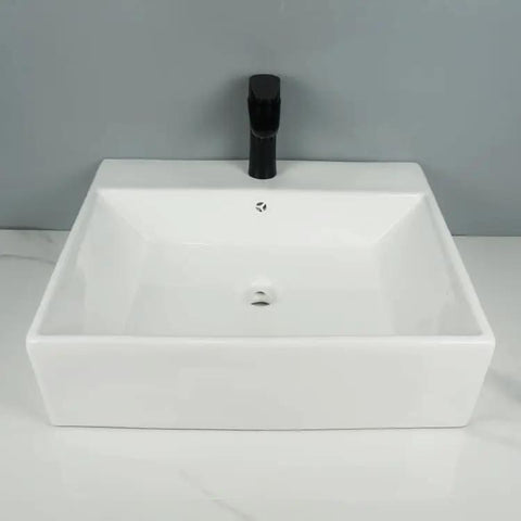 Bathroom Sink White Ceramic Balcony Wall-Mounted Sink Modern Simple Square Sink above view with black faucet and drain.