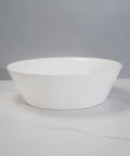 USZWBY Vessel Sinks Bathroom Vessel Sink European Style Light Luxury Round White Wash Basin Countertop Bathroom Bowl Sink on marble surface.