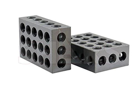 Two hardened steel 1-2-3 precision blocks with multiple round holes, angled front and side views