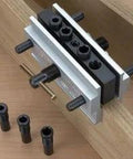 Self Centering Doweling Jig With Six Hardened Drill Bushings on round stock, showing 1/4, 5/16, 3/8 inch bushing sizes and use