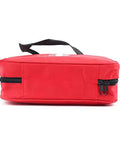 Side view of red PAXLAMB first aid bag, empty medical kit pouch with black zippers and top handle