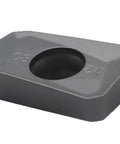 Gray rectangular carbide insert block with central round bore for CNC milling tools