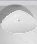 USZWBY Vessel Sinks Bathroom Sink Triangle White Countertop Wash Basin Apartment Ceramic Bathroom Bowl Sink viewed from above.