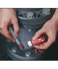 Applying Red Threadlocker Stick High Strength 19 Gram Semi Solid Anaerobic Adhesive For Metal Fasteners Car Maintenance And Industrial Use Keeps Threads From Loosening Under Vibration on metal bolt