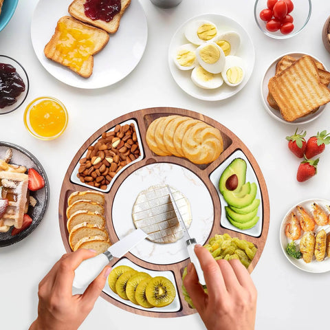 360 degree rotating lazy susan cheese and charcuterie board set with 13.5 inch acacia wood serving board filled with snacks.