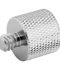 Close-up of 3/8 Inch Female To 1/4 Inch Male Thread Adapter for Camera Monitors, nickel plated brass construction, knurled design.