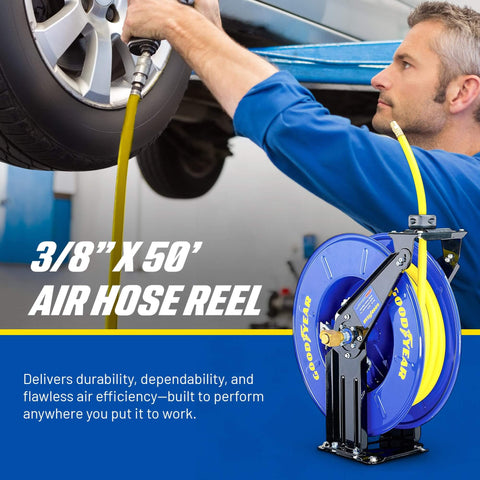 Mechanic using a Retractable Air Hose Reel Three-Eighths Inch By 50-Foot Heavy Duty Premium SBR Hose Up To 300 Psi Reinforced Steel Construction Spring Driven Industrial Dual Arm And Pedestal The Workhorse For Your Workshop Or Garage in a garage setting