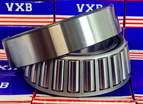 33121 Tapered Roller Wheel Bearing 105x175x56mm, chrome steel, showing cone and cup, front view with VXB packaging background.