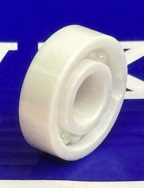 R4 Full Complement Full Ceramic Bearing 1/4" x 5/8" x 0.196" ZrO2 Bearing, angled view showing open design, no cage, in zirconia material