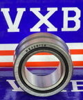NKI20/16 Needle Roller Bearing 20x32x16mm - Machined Type front view against VXB packaging