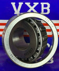 15101/15244 Tapered Roller Bearing 1" x 2.440" x 0.8125" inch, chrome steel, front view showing cone and cup with VXB branding.