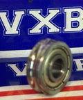 4x12x4/5mm U-Groove Track Roller Bearing Extended inner ring width of 5mm with VXB packaging background
