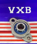 12mm Miniature Flanged Stainless Steel Mounted Bearing Block on a blue and red background.