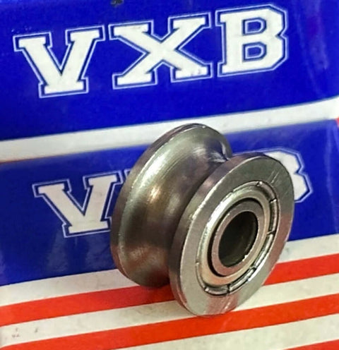 4mm Bore Bearing - 13mm Shielded Pulley U-Groove Track Roller 4x13x7mm on colorful striped background