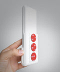 Hand holding Ultra Strong 3M VHB 5952 Adhesive Circles, 1 Inch Round, 25 Pack, attached to a white plastic object