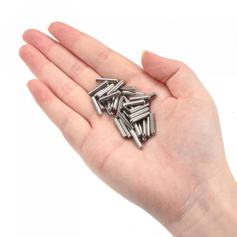 Hand holding 3x15mm Dowel Pins Set 50 Pcs 304 Stainless Steel Round Head Flat Chamfered End Dowel Pins for furniture assembly