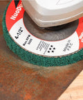 10 Pack 4 1 Half Inch Flap Discs For Angle Grinder Set With 180 And 320 Grits in use on metal rust removal