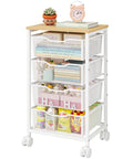 Rolling Storage Cart With Four Drawers And Wooden Top Metal Frame Lockable Wheels And Smooth Slide Drawers A Must Have Craft Organizer For Living Room Bedroom Office And Classroom In Bright White, front view with decor