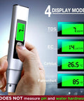 4 in 1 Tds Meter Digital Water Tester displaying TDS, EC, Celsius, and Fahrenheit readings held in hand