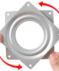 Hands holding 2 Pack 4 Inch Square Lazy Susan Turntable Bearings, Heavy Duty Steel Ball Bearing Rotating Trays with Low Profile Design, zinc plated.