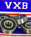 4-Pack 6201-2RS Ball Bearings Rubber Sealed 6201RS with chrome steel and double rubber seals, shown in front of VXB packaging