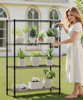 Woman watering plants on a 4 Tier Wire Shelving Unit 36x14x54 Black Adjustable Racks Holds 1000 Lbs No Tool Assembly Ideal For Home Garage