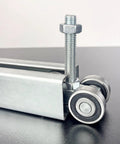 Four Wheel Trolley Assembly With Silent Rolling, M10 Bolt, Fits 1-5/8 Inch Wide Strut Channel, Close-up View