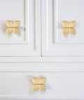 Gold Cabinet Knobs 10 Pack For Cabinets And Drawers, Brushed Brass Leaf Style Hardware showcased on white cabinet