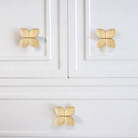 Gold Cabinet Knobs 10 Pack For Cabinets And Drawers, Brushed Brass Leaf Style Hardware showcased on white cabinet
