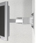 Side view of wall-mounted monitor with adjustable arm for optimal positioning, attached securely using DuoPower Universal Plug Kit 1/4 Inch By 1-3/16 Inch S PH.