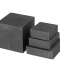 Stack of Solid Graphite Square Blocks, 15x100x100mm, 8 to 50mm thick, heavy duty electrode plates for casting, electrolysis, and sintering.