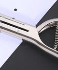 Heavy Duty Handheld Single Hole Punch For Crafts And Scrapbooking, Go-To 3/8 Inch (10mm) Zinc Alloy Punch, shown punching paper