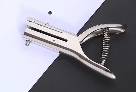 Heavy Duty Handheld Single Hole Punch For Crafts And Scrapbooking, Go-To 3/8 Inch (10mm) Zinc Alloy Punch, shown punching paper