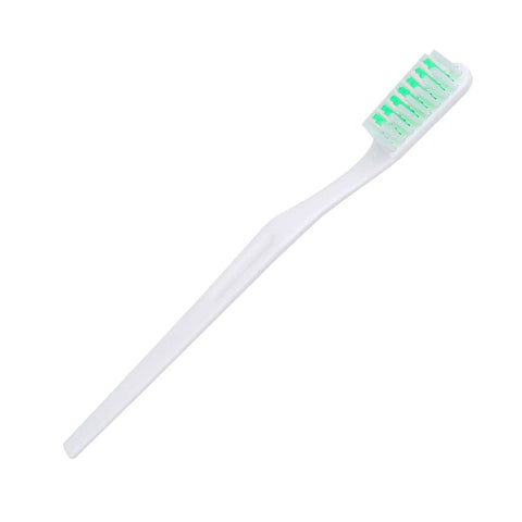 White toothbrush with soft bristles for gentle dental care and cleaning, featuring a green grip.