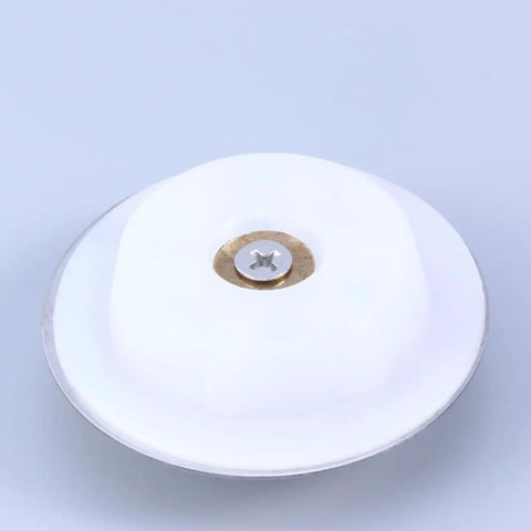 Top view of a Stainless Steel Bathtub Stopper for 40-45mm Drain Holes with white finish and brass center.