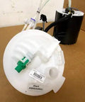 New Genuine Engine Fuel Pump For Land Rover LR2 Range Rover Sport Direct Fit Replacement LR038599 Heavy Duty Electric Inline Unit close-up view showing inlet and outlet connections.