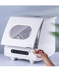 Smooth Operator Countertop Dishwasher Portable Compact Kitchen Must Have Featuring Responsive Touch Pad in white with an open door.