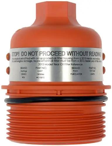 Patented Beefed Up Aluminum Engine Oil Filter Housing with Oil Cooler, visible orange cap and warning label for Chrysler Dodge Jeep Ram